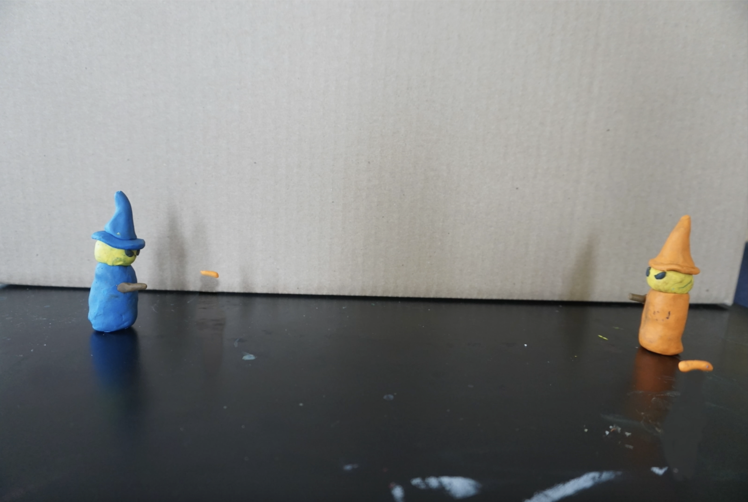 1 frame from a stop motion animation of wizards.